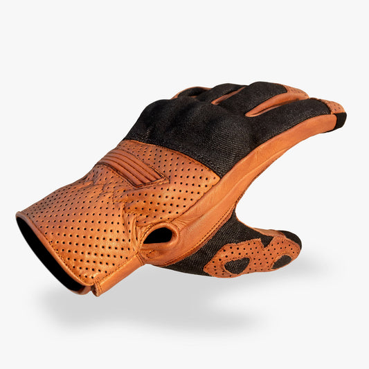 Side view of black denim and camel brown leather motorcycle glove featuring perforated leather cuff, reinforced stitching, and breathable materials for all-day riding comfort