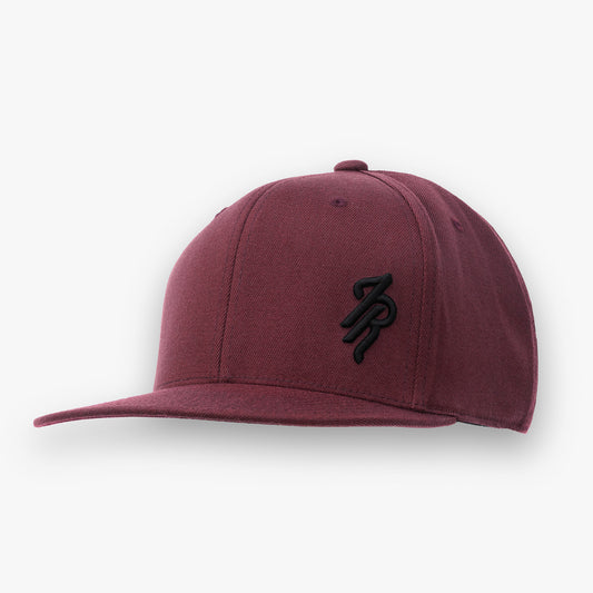 Maroon cap with a logo on a white background