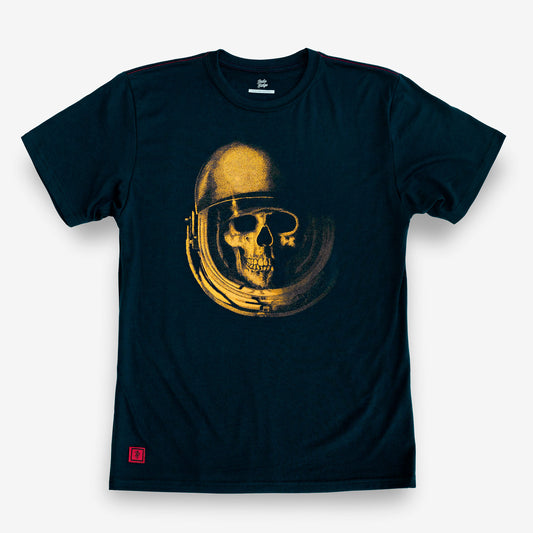 A dark navy blue short-sleeve t-shirt with a graphic print of a skull wearing a gold astronaut helmet on the front, displayed against a light gray background.