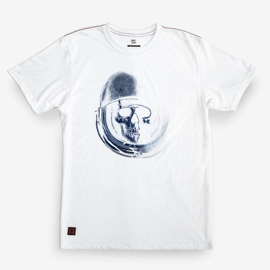 A white short-sleeve crewneck t-shirt featuring a dark blue graphic print of a skull inside an astronaut helmet on the front, displayed against a light gray background.
